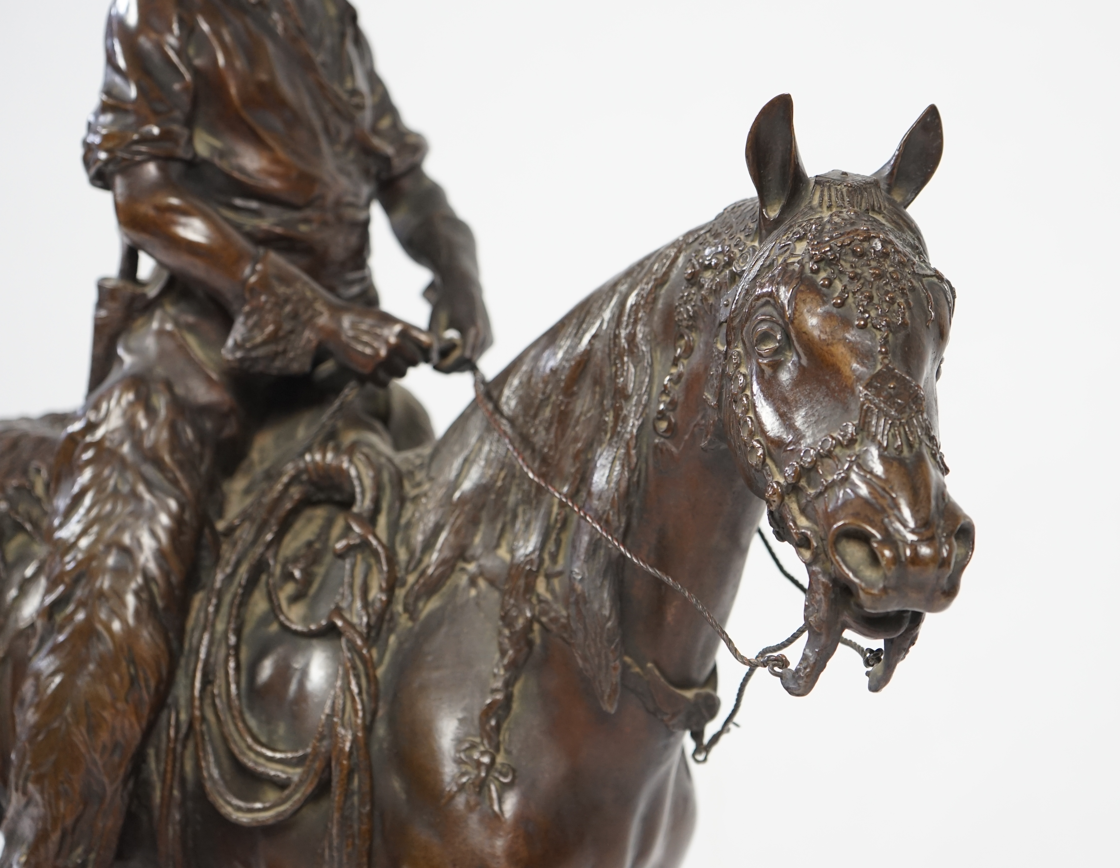 Walter Winans (St. Petersburg, 1852-Parsloe Park, Essex, 1920), a cast bronze of the artist, as a cowboy, riding the Arab stallion Skowronek, 50cm wide, 66cm high, overall 79.5cm high